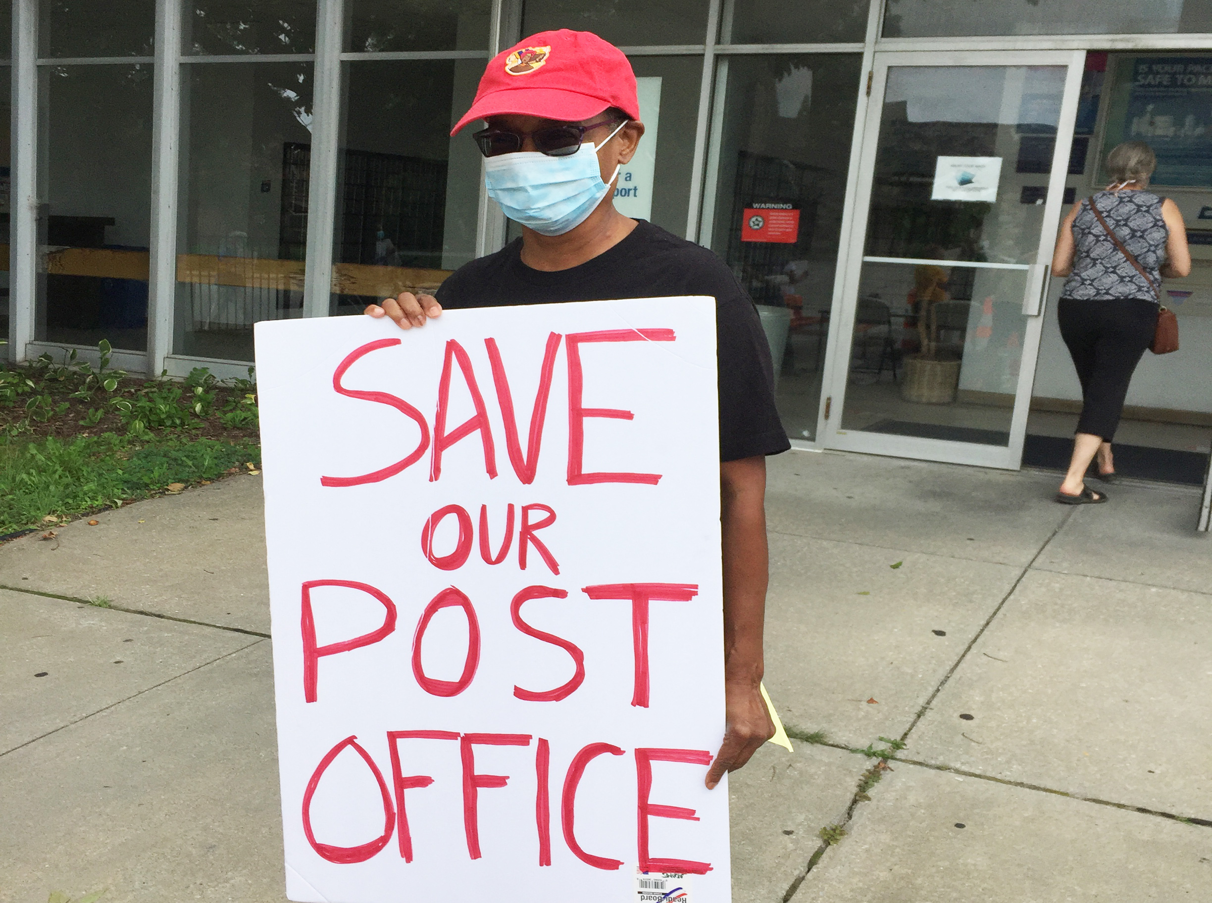Baltimore residents rally for postal service, labor, and democracy